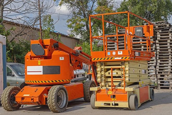 forklift transporting goods in a large warehouse in Bonner